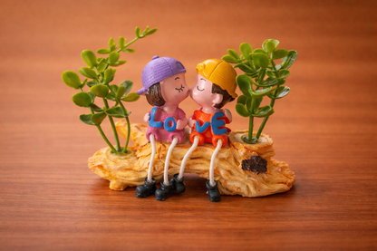Romantic Miniature Couple Love Wall Planter with Artificial Greenery. Designs may vary.